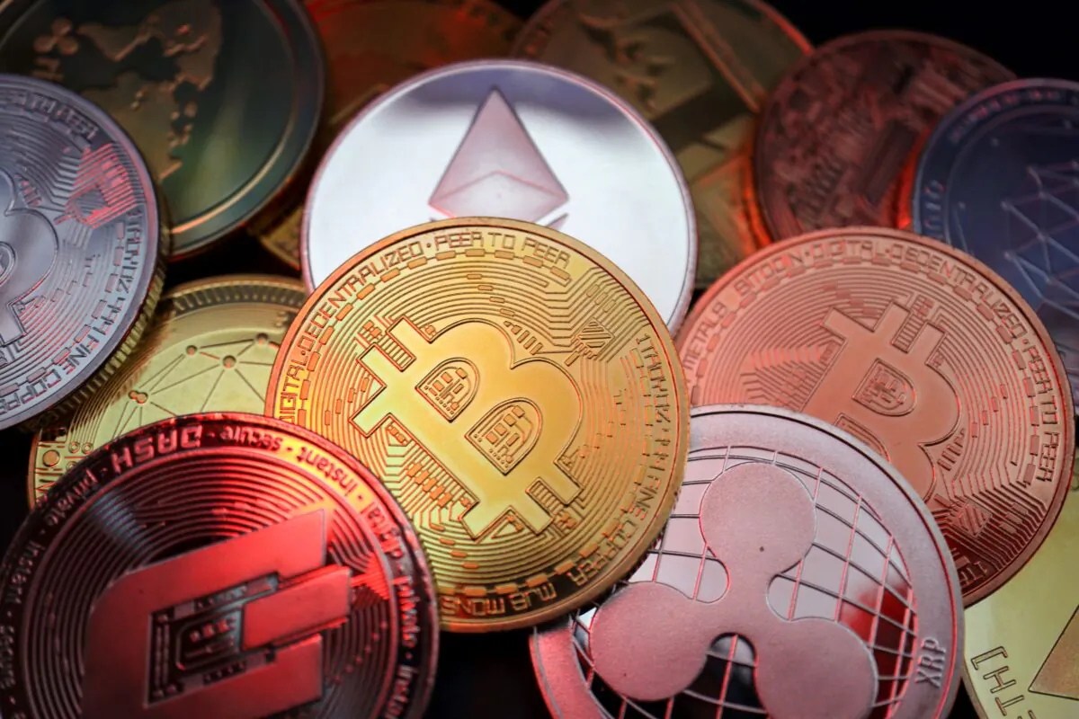 Representations of cryptocurrencies including Bitcoin, Dash, Ethereum, Ripple, and Litecoin are seen in this illustration picture taken on June 2, 2021. (Florence Lo/Illustration/Reuters)