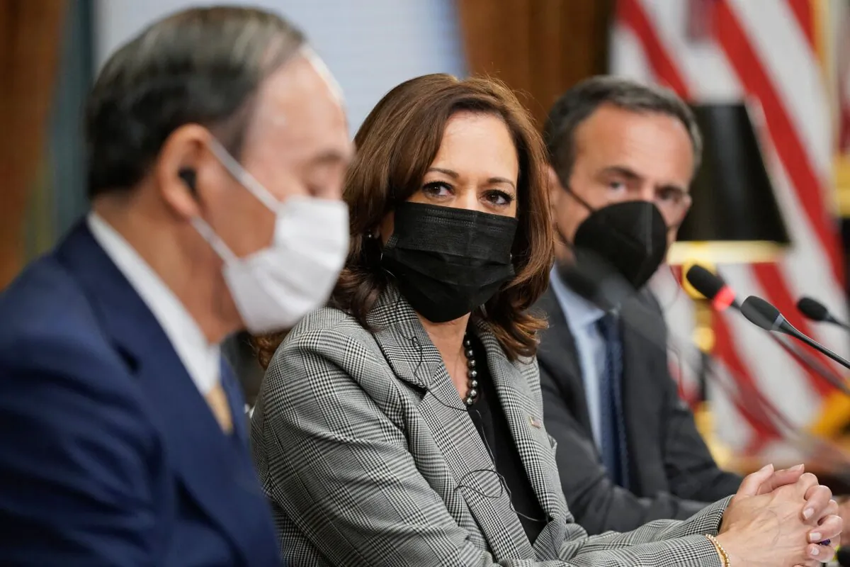 U.S. Vice President Kamala Harris, center, meets with Japanese Prime Minister Yoshihide Suga, left, in the Vice President's Ceremonial Office at he Eisenhower Executive Office Building next to the White House in Washington on Sept. 24, 2021. (Patrick Semansky/Pool/AFP via Getty Images)