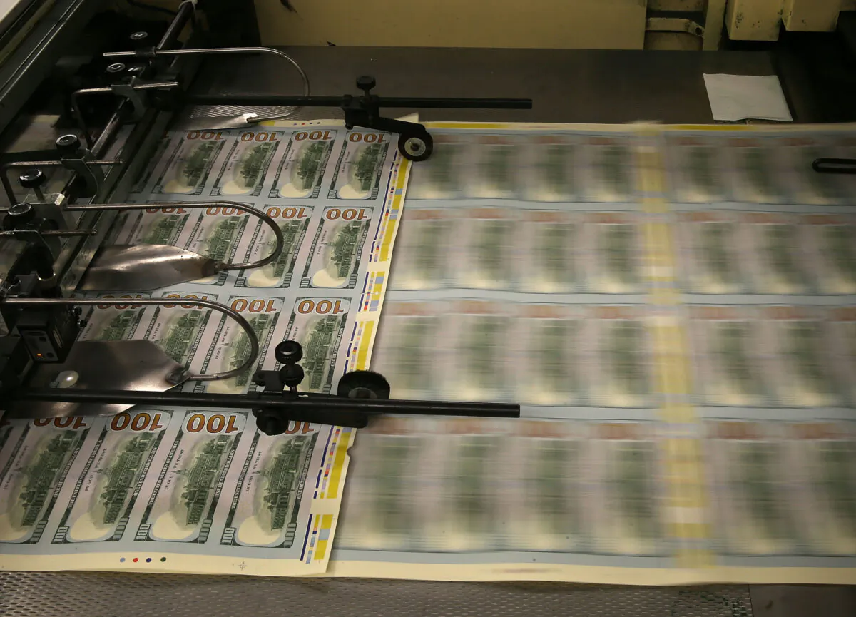 $100 notes are printed at the Bureau of Engraving and Printing in Washington in a file photo. (Mark Wilson/Getty Images)