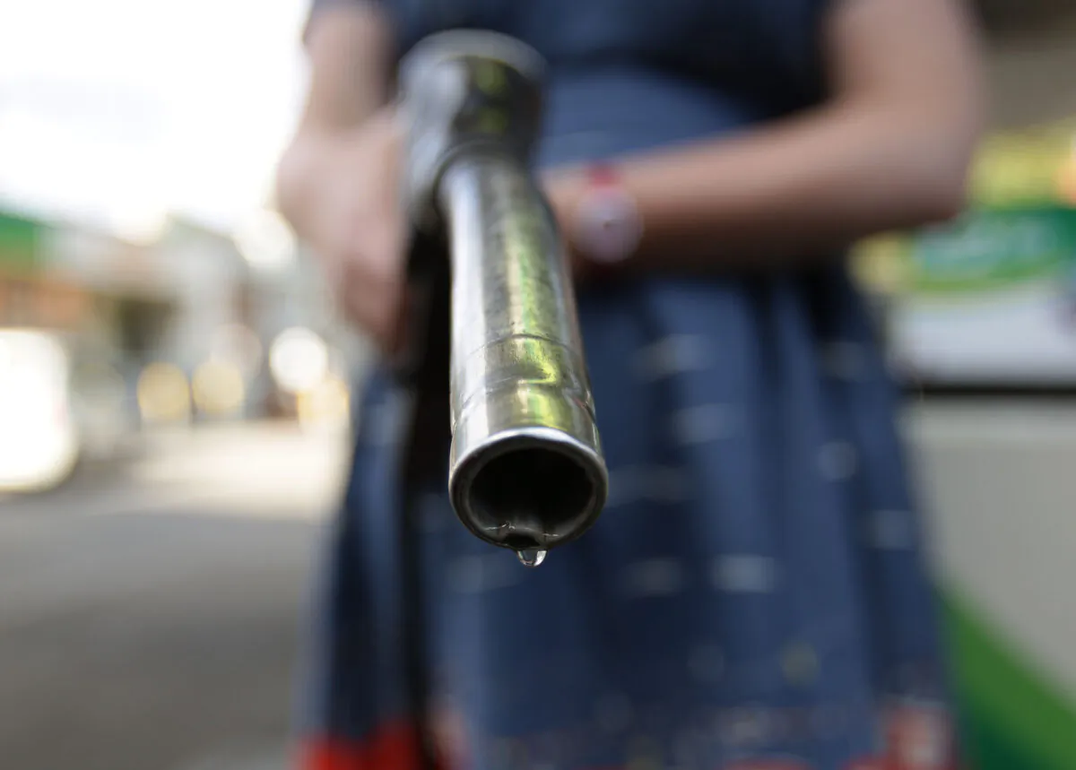 A car being filled up with diesel at a petrol station in London, in an undated photo. (Yui Mok/PA)