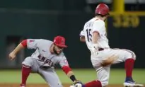 Rookies Lead Rangers Past Angels 5-2 to Avoid 100th Defeat