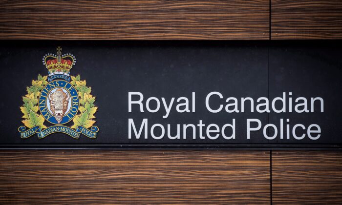 The RCMP logo is seen outside Royal Canadian Mounted Police "E" Division Headquarters in Surrey, B.C., on April 13, 2018. (The Canadian Press/Darryl Dyck) 