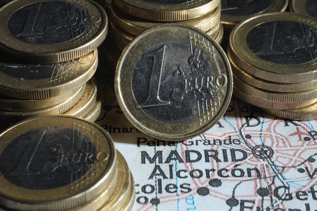 In this photo illustration columns of one-euro coins stand on a map of Spain next to Madrid in Berlin, Germany, on Aug. 6, 2012. (Sean Gallup/Getty Images)