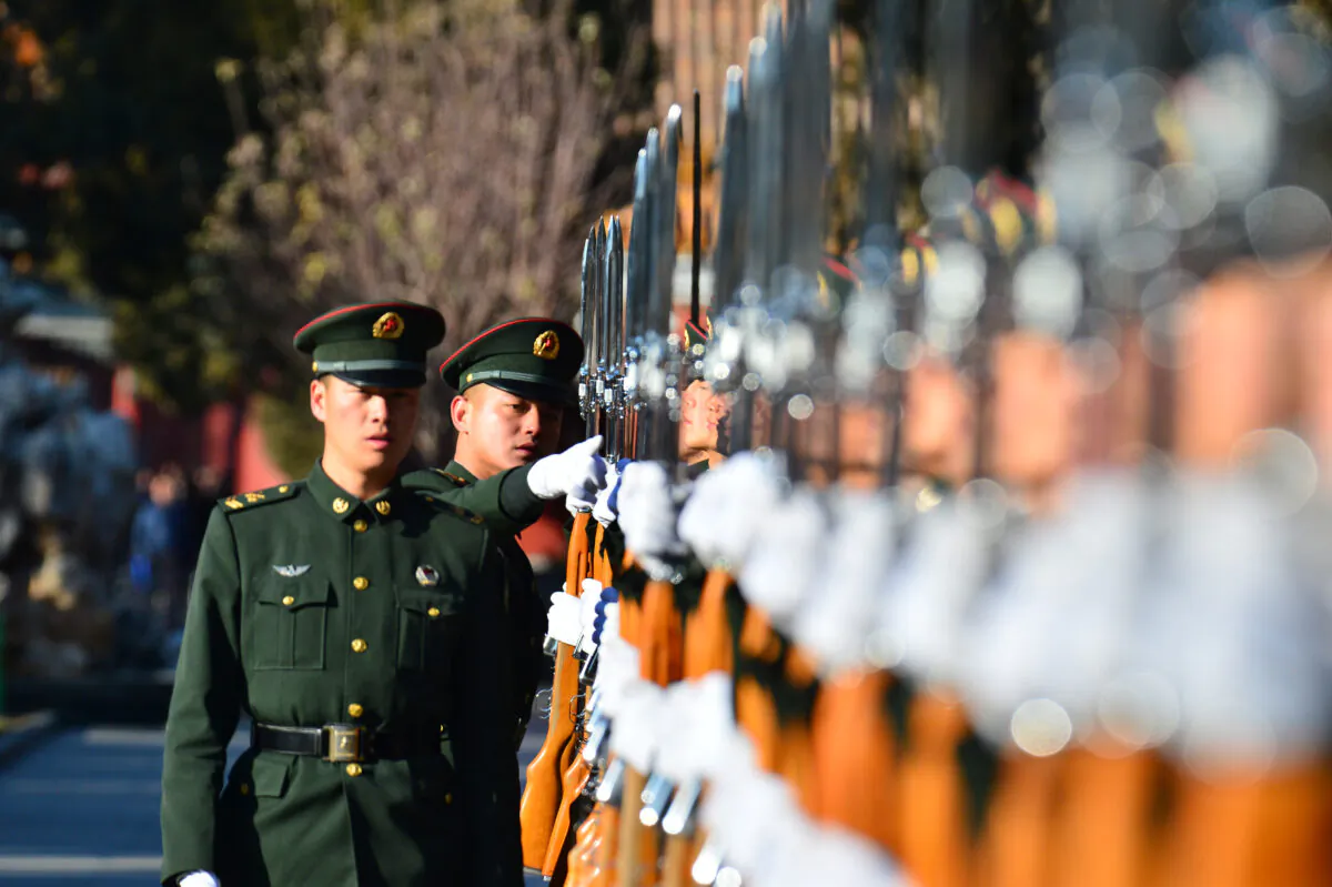 Members of the Chinese People's Liberation Army honor guard train in China's capital Beijing on Jan. 1, 2018. (AFP via Getty Images)
