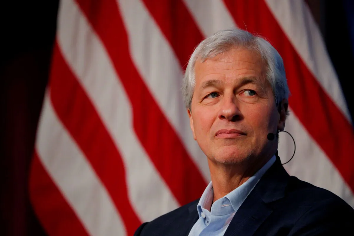 Jamie Dimon, CEO of JPMorgan Chase, takes part in a panel discussion about investing in Detroit at the Kennedy School of Government at Harvard University in Cambridge, Mass., on April 11, 2018. (Brian Snyder/Reuters)