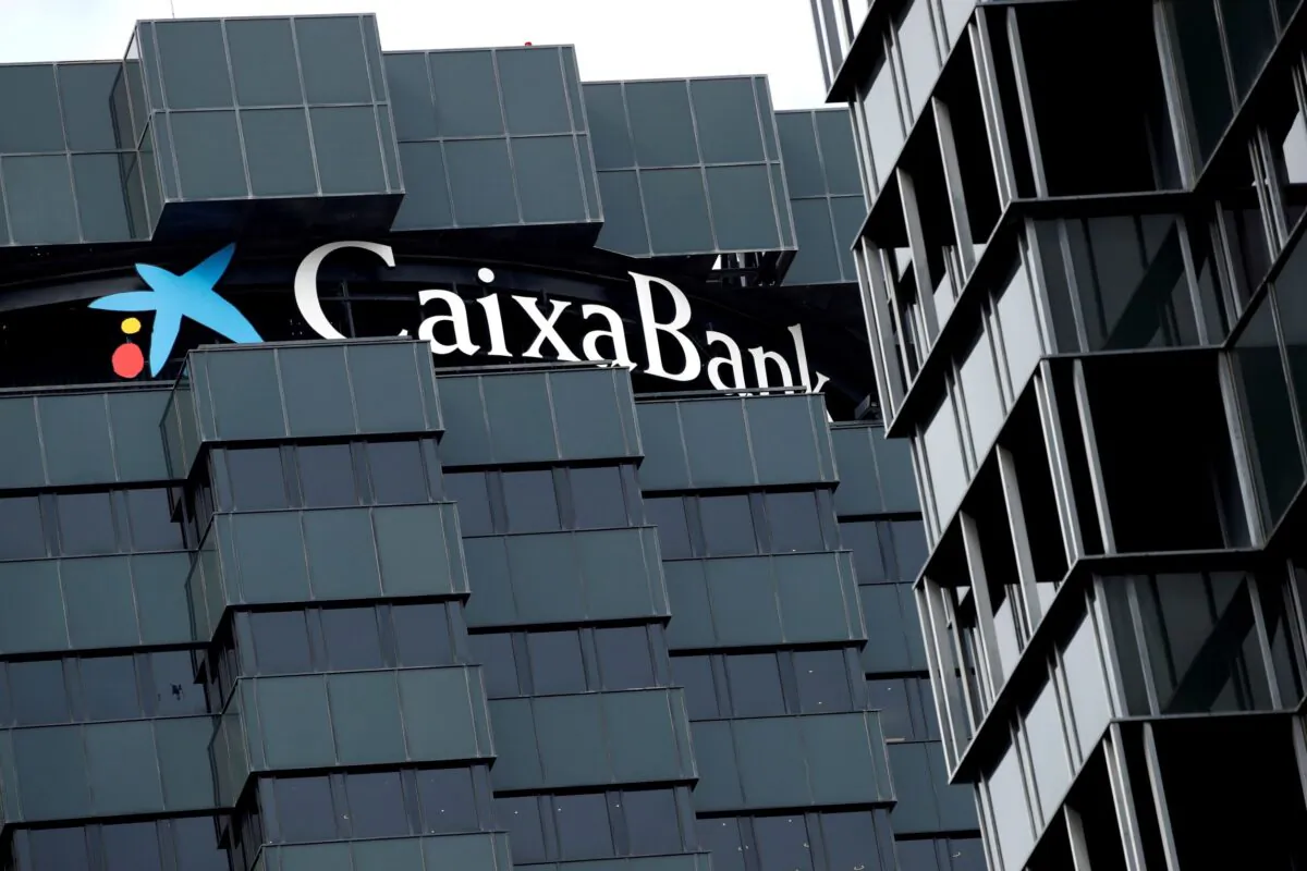 CaixaBank's logo is seen on top of the company's headquarters in Barcelona, Spain on Sept. 17, 2020. (Albert Gea/Reuters)