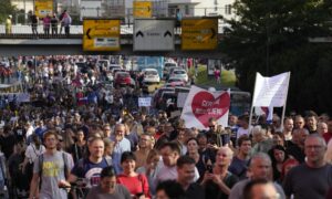 Slovenia Halts J&J Vaccine After Young Woman’s Death; Mass Protest Erupts in Capital