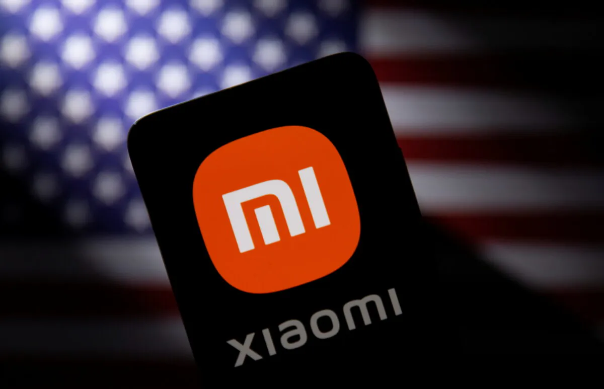 Smartphone with a Xiaomi logo is seen in front of a U.S. flag in this illustration taken on Sept. 28, 2021. (Dado Ruvic/Reuters)