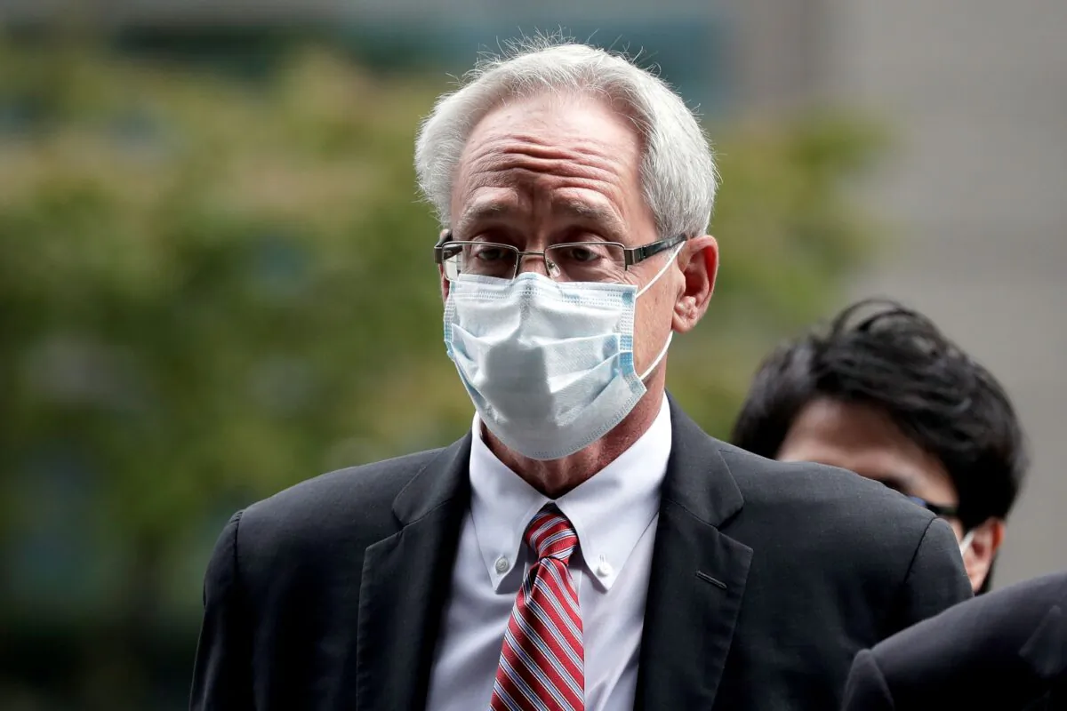 Greg Kelly, former representative director of Nissan Motor Co., arrives for the first trial hearing at the Tokyo District Court in Tokyo, Japan on Sept. 15, 2020. (Kiyoshi Ota/Pool via Reuters)