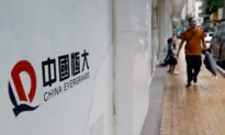 Evergrande Share Trading Suspended As Debt Test Approaches