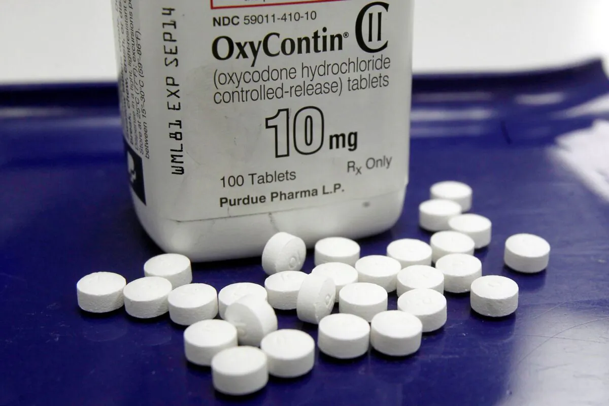 This photo shows OxyContin pills arranged at a pharmacy in Montpelier, Vt., on Feb. 19, 2013. (Toby Talbot/Photo via AP)