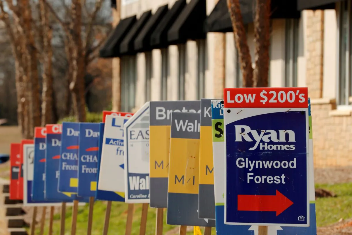 Real estate signs advertise new homes for sale in multiple new developments in York County, S.C., on Feb. 29, 2020. (Lucas Jackson/Reuters)