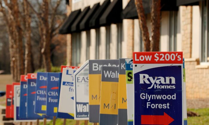Real estate signs advertise new homes for sale in multiple new developments in York County, S.C., on Feb. 29, 2020. (Lucas Jackson/Reuters)