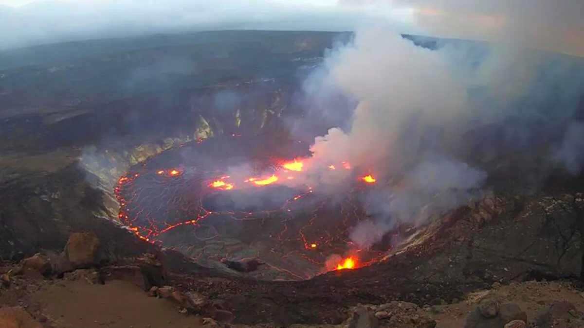 This webcam image provided by the United States Geological Survey shows a view of an eruption that has begun in the Halemaumau crater at the summit of Hawaii’s Kilauea volcano on Sept. 29, 2021. (USGS via AP)
