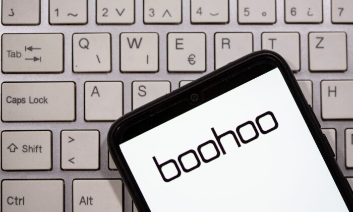 A smartphone with the Boohoo logo displayed is seen on a keyboard in this illustration taken on Sept. 30, 2020. (Dado Ruvic/Illustration/Reuters)