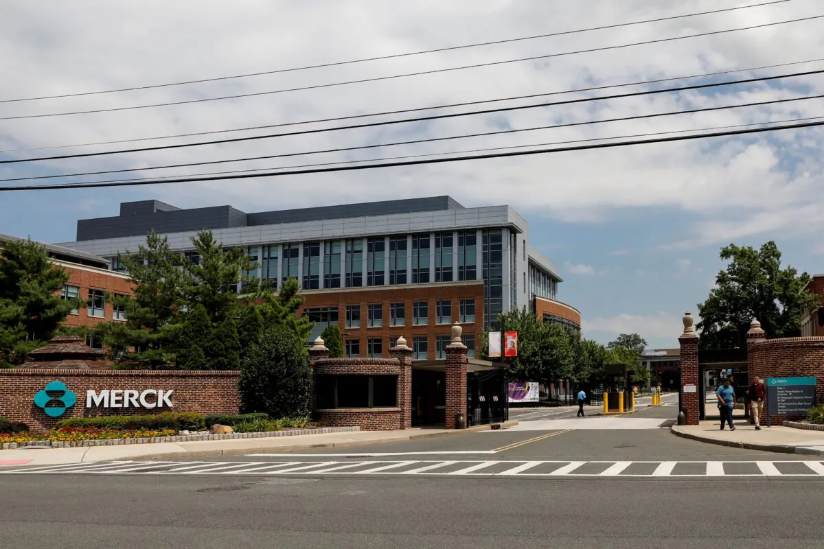 The Merck logo is seen at a gate to the Merck & Co. campus in Rahway, N.J., on July 12, 2018. (Brendan McDermid/Reuters)