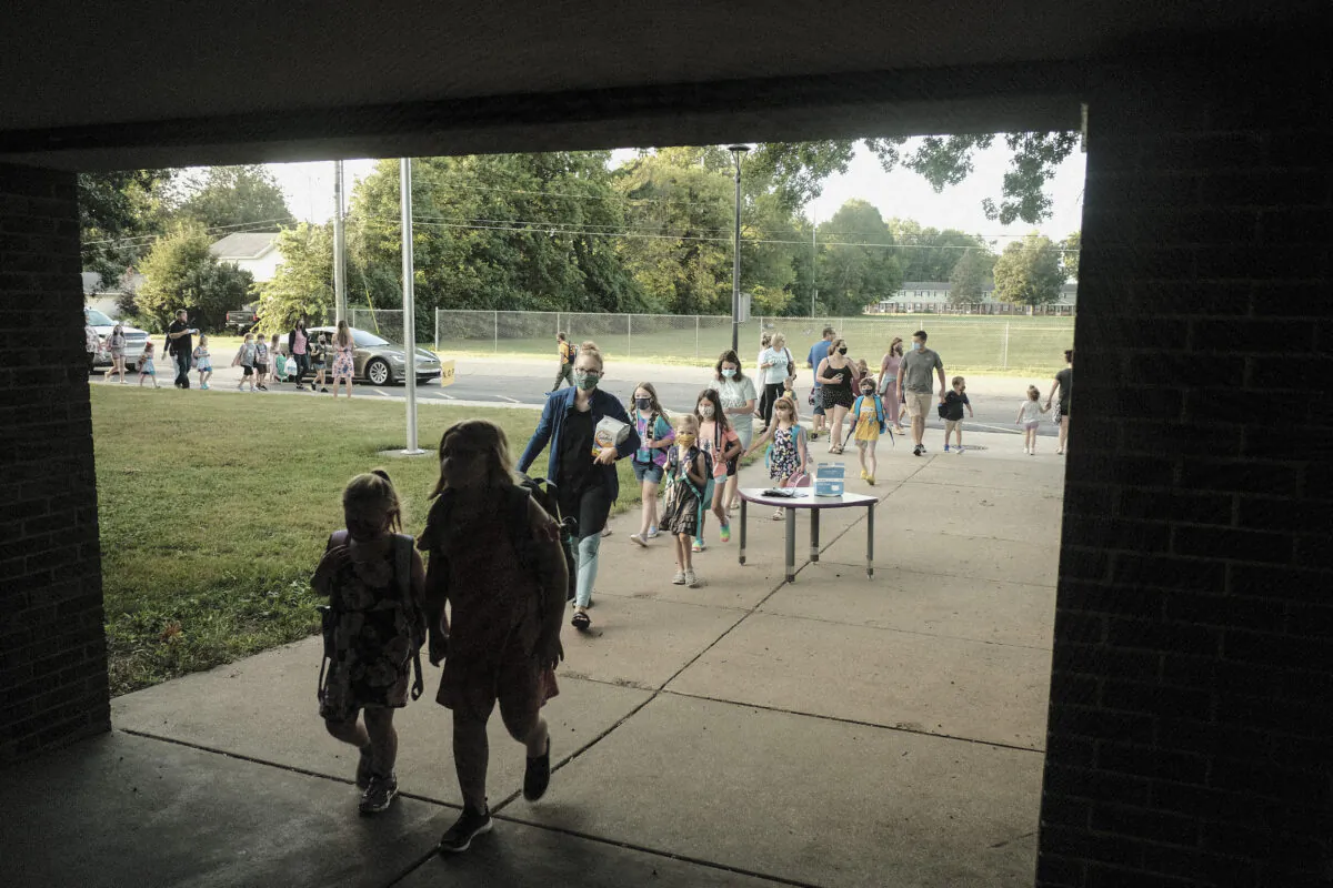 Students return for the first day of the school year at an elementary school in Michigan on Aug. 30, 2021. (Matthew Hatcher/Getty Images)