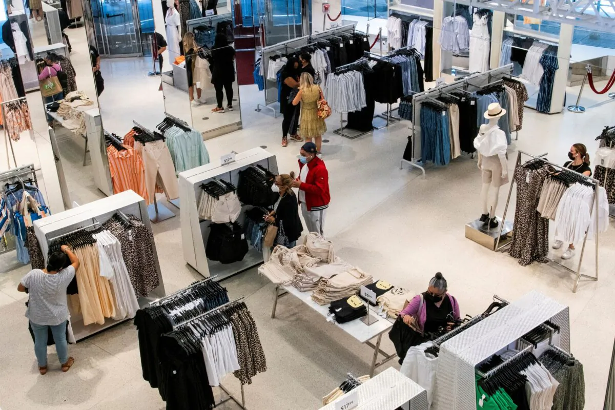Shoppers visit H&M store at Times Square in New York City, N.Y., on May 20, 2021. (Eduardo Munoz/Reuters)