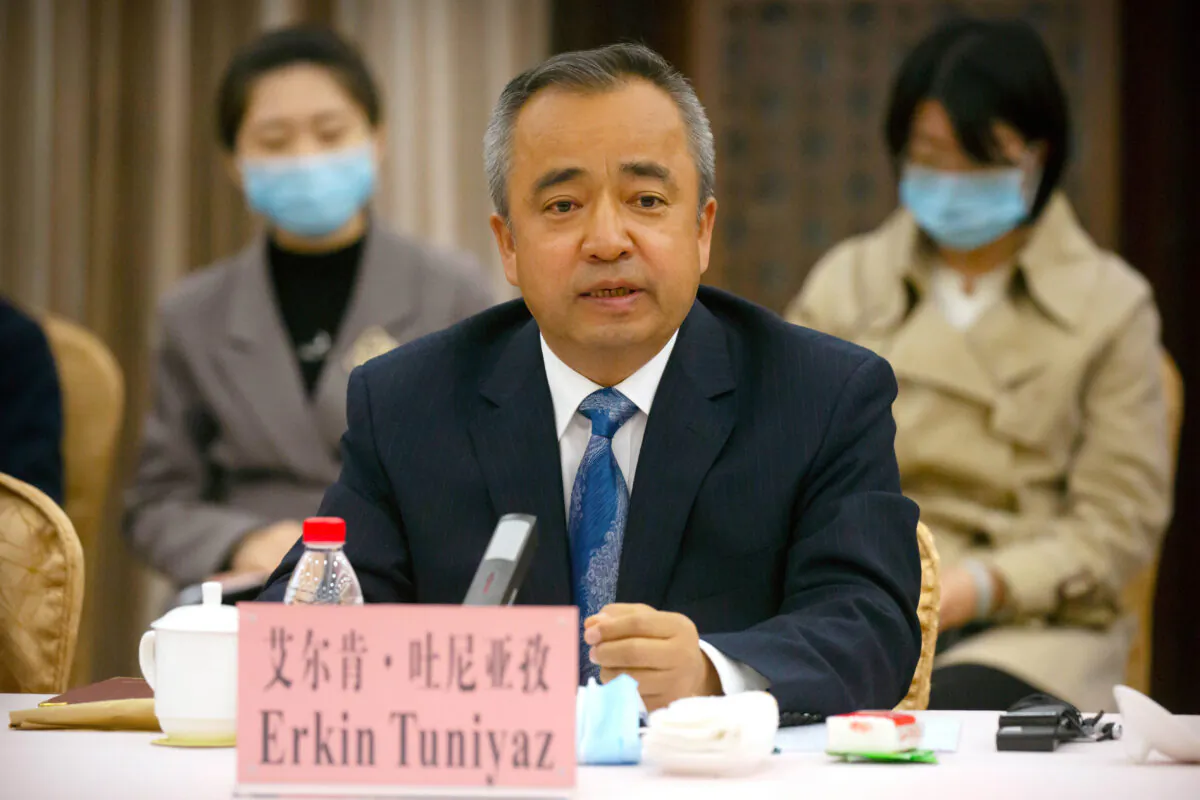 Erkin Tuniyaz speaks during a press conference in Urumqi in northwestern China's Xinjiang Region, on April 22, 2021. (Mark Schiefelbein/AP Photo)