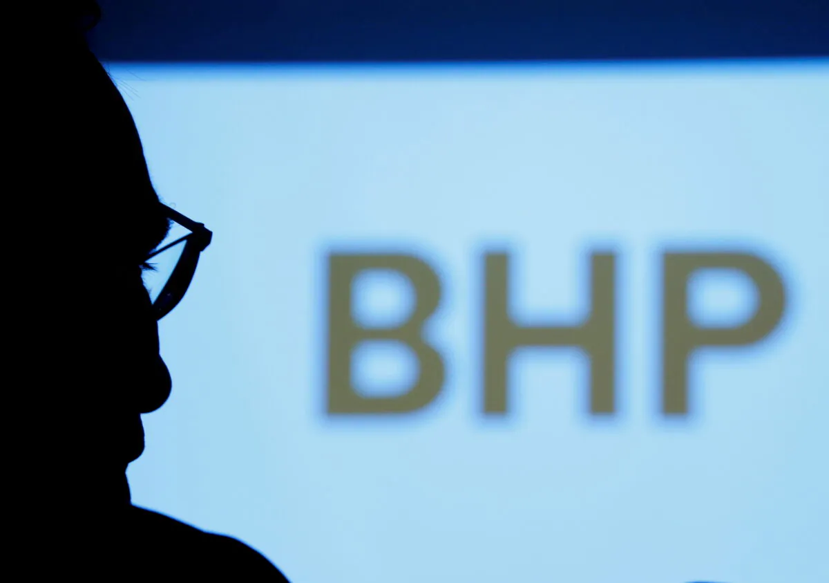 BHP's logo is projected on a screen during a round-table meeting with journalists in Tokyo, Japan, on June 5, 2017. (Kim Kyung-Hoon/Reuters)