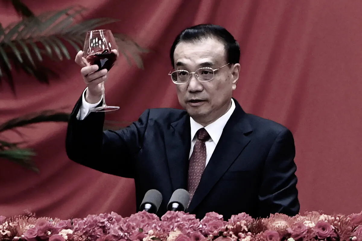 Chinese Premier Li Keqiang raises his glass after a speech at a reception at the Great Hall of the People in Beijing on Sept. 30, 2021. (Greg Baker/AFP via Getty Images)