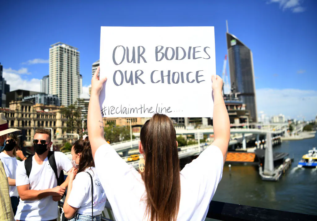 Protesters march across Victoria Bridge during a rally against a mandatory COVID-19 vaccine in Brisbane, Australia on Oct. 01, 2021 (Dan Peled/Getty Images)
