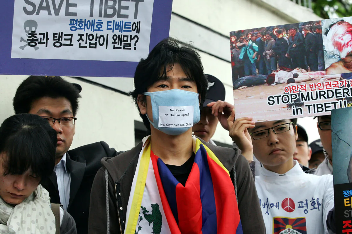 Protesters participate in a pro-Tibet rally in front of the Chinese embassy In Seoul, South Korea, on April 29, 2008. (Chung Sung-Jun/Getty Images)