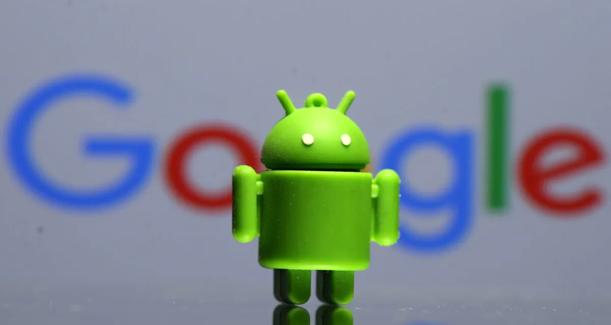 A 3D printed Android mascot Bugdroid is seen in front of a Google logo in this illustration taken on July 9, 2017. (Dado Ruvic/Reuters, Illustration)