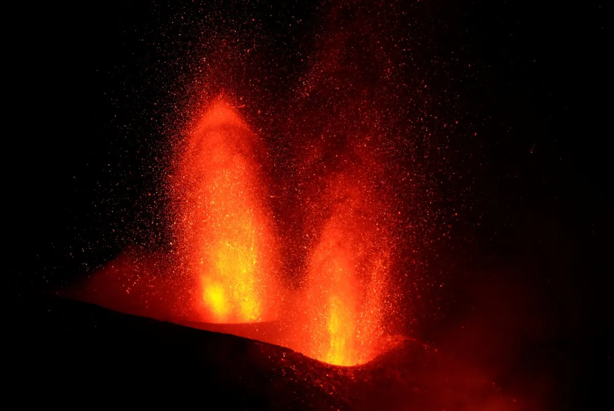 Lava flows following the eruption of a volcano, in Tacande de Arriba, on the Canary Island of La Palma, Spain, on Oct. 1, 2021. (Juan Medina/Reuters)