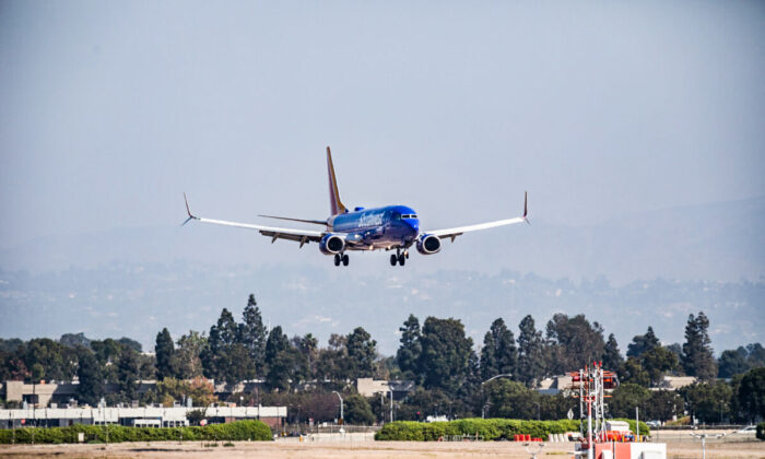 A Southwest Airlines aircraft lands at John Wayne Airport in Santa Ana, Calif., on Oct. 18, 2020. (John Fredricks/The Epoch Times)