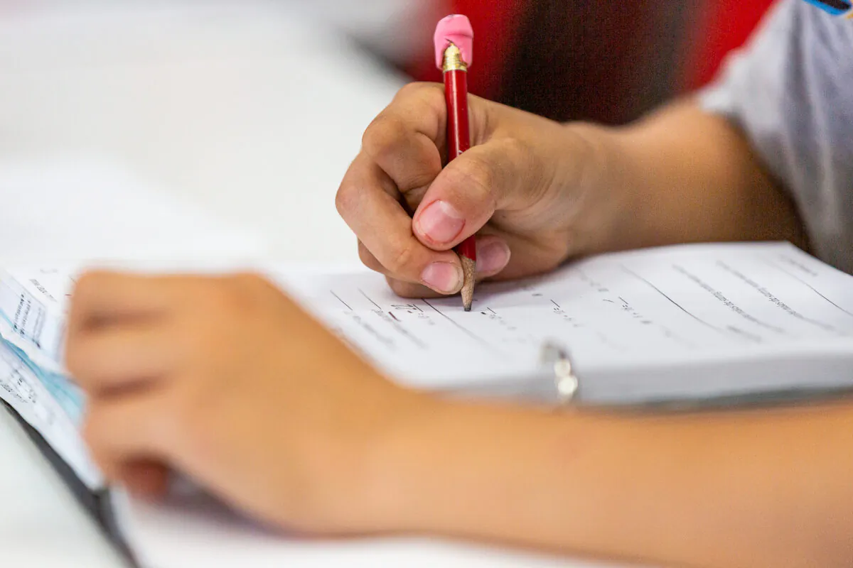 A student performs a math assignment in California on May 12, 2021. (John Fredricks/The Epoch Times)