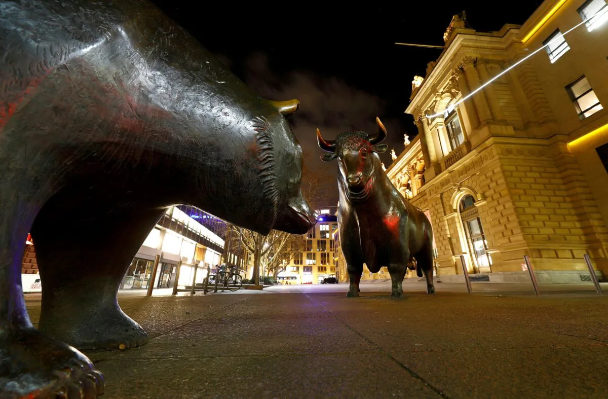 Bull and bear symbols for successful and bad trading are seen in front of the German stock exchange (Deutsche Boerse) in Frankfurt, Germany, on Feb. 12, 2019. (Kai Pfaffenbach/Reuters)