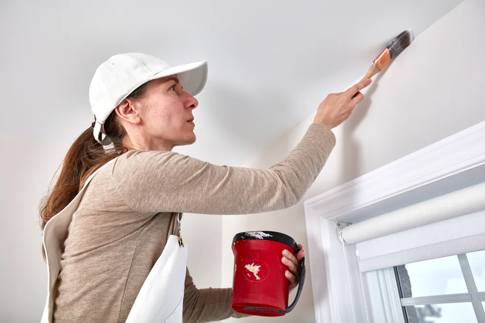 Using the proper paintbrush is as important as wall or trim preparation and selecting the proper paint. (kurhan/Shutterstock)