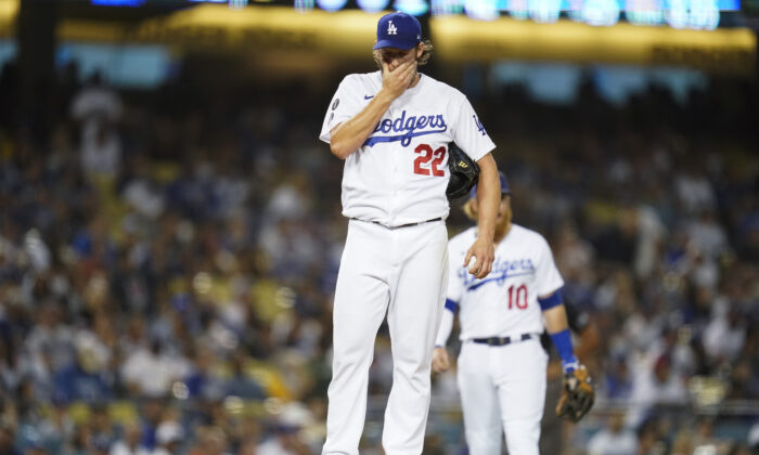 Los Angeles Dodgers starting pitcher Clayton Kershaw (22) reacts on the mound before he exits the game during the second inning of a baseball game against the Milwaukee Brewers Friday, Sept. 1, 2021, in Los Angeles. (Ashley Landis/AP Photo)
