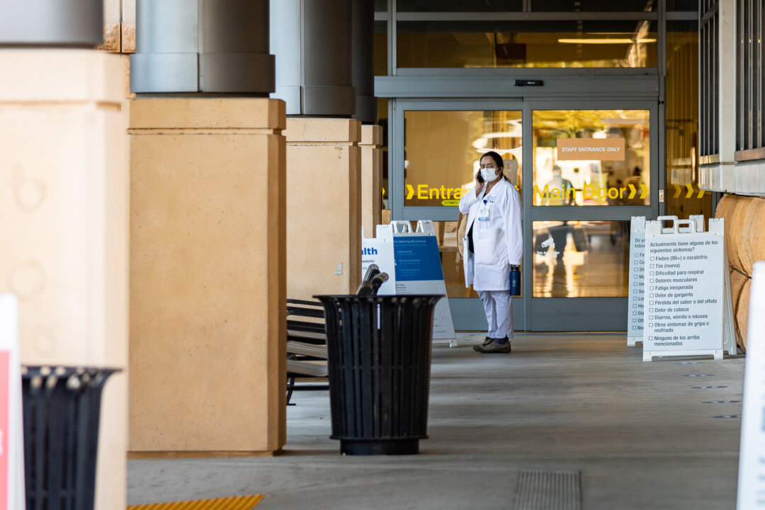 Healthcare workers at St. Joseph Hospital in Orange, Calif., on Dec. 16, 2020. (John Fredricks/The Epoch Times)
