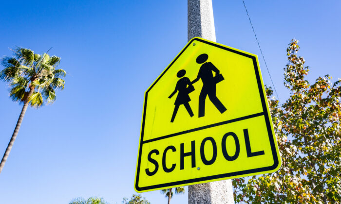 In this file photo, a sign is seen near Sonora Elementary School, in Costa Mesa, Calif., on Dec. 1, 2020. (John Fredricks/  Pezou)