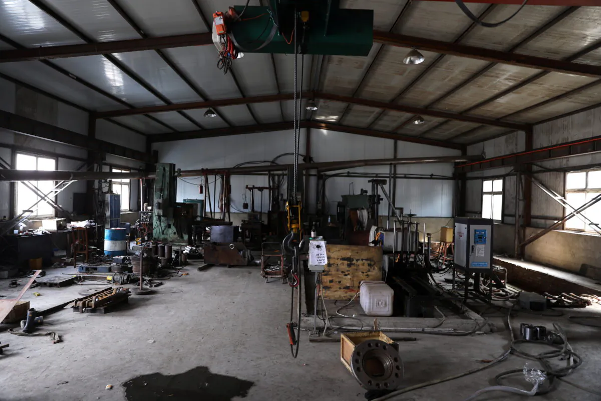 Machinery is seen at a factory specializing in heat treatment on metals, which is out of operation, at an industrial park in Shenyang, Liaoning province, China, on Sept. 30, 2021. (Tingshu Wang/Reuters)