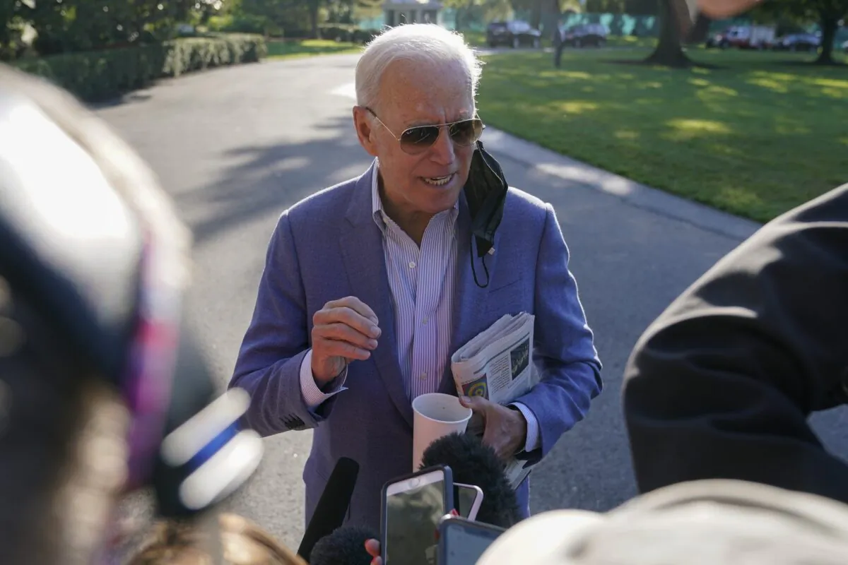 President Joe Biden speaks with reporters before departing for Delaware, outside the White House on Oct. 2, 2021. (Patrick Semansky/AP Photo)