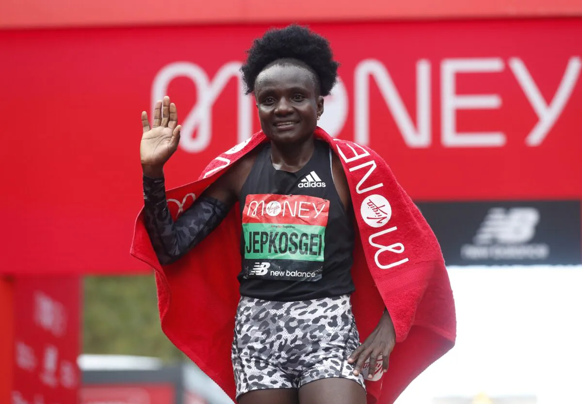 Kenya's Joyciline Jepkosgei celebrates winning the elite women's race at the London Marathon, London, Britain, on Oct. 3, 2021. (Matthew Childs/Reuters)