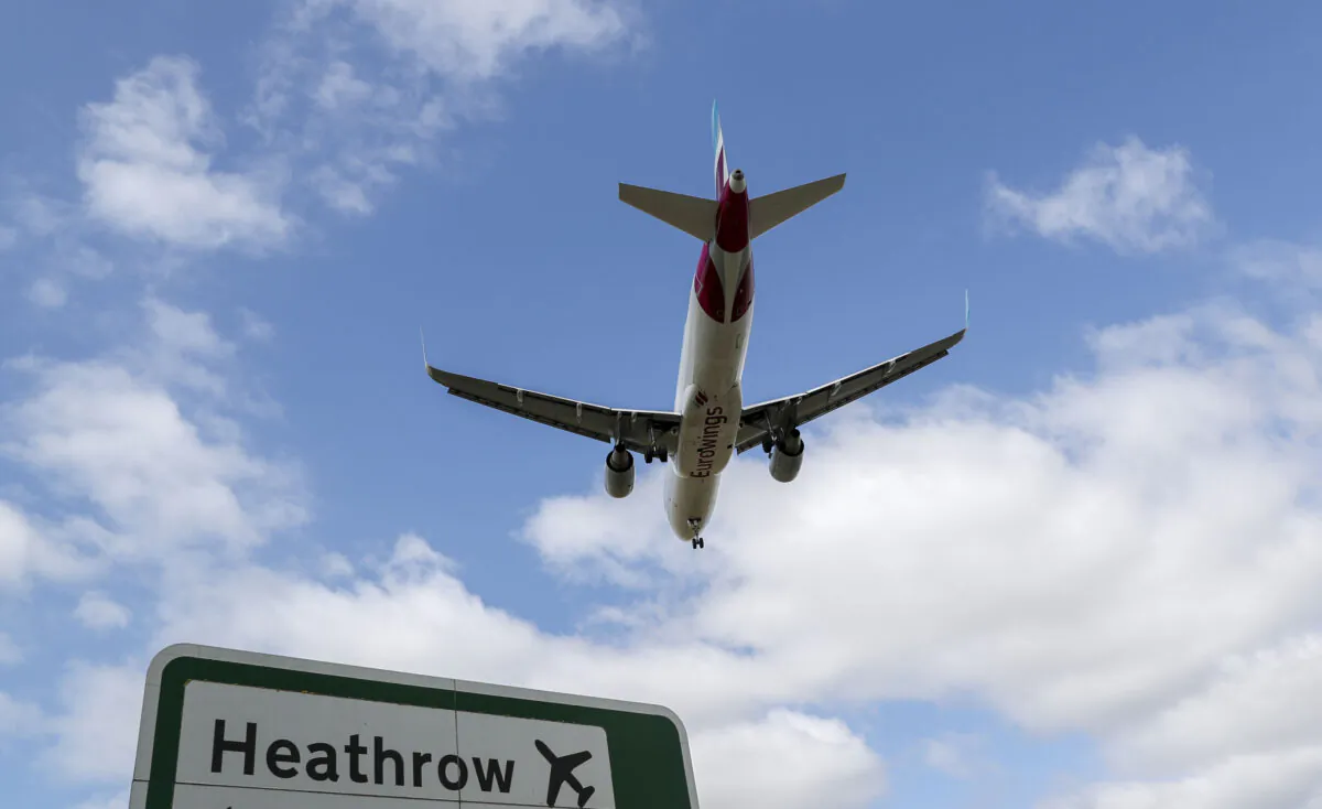 A plane landing at Heathrow airport in London, on June 8, 2020. (Steve Parsons/PA)