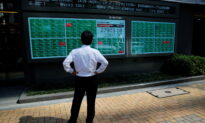 Asian Shares Slip as Evergrande, Inflation Worries Sap Positive Mood