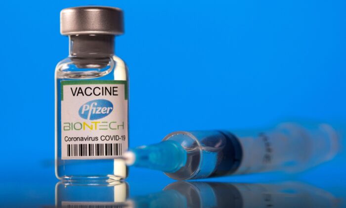 A vial labelled with the Pfizer-BioNTech COVID-19 vaccine is seen in this illustration picture taken on March 19, 2021. (Dado Ruvic/Illustration/Reuters)