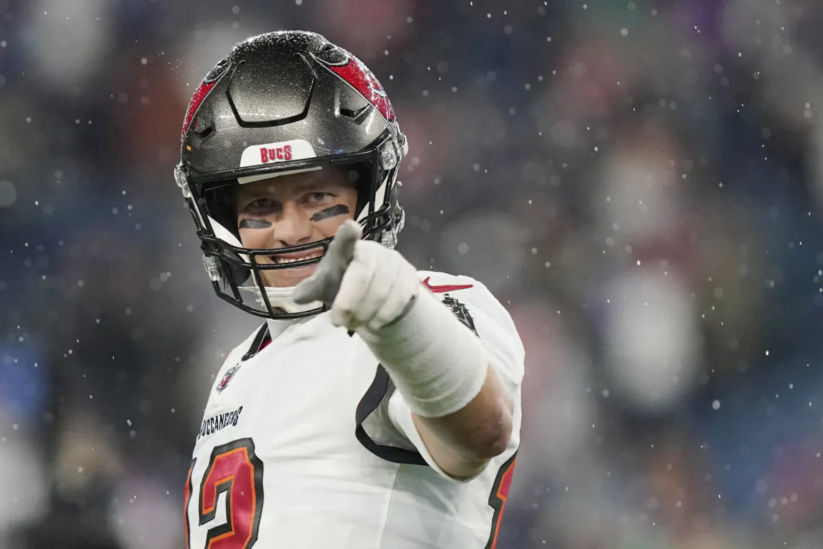Tampa Bay Buccaneers quarterback Tom Brady (12) points toward the sidelines prior to an NFL football game between the New England Patriots and Tampa Bay Buccaneers, in Foxborough, Mass., on Oct. 3, 2021. (Steven Senne/AP Photo)