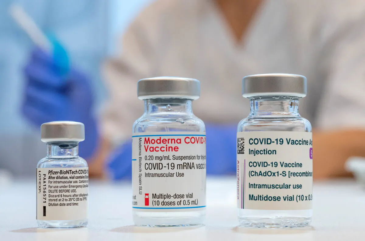 Used vials of the Pfizer-BioNTech, Moderna, and AstraZeneca coronavirus disease (COVID-19) vaccines are pictured at the Skane University Hospital vaccination centre in Malmo, Sweden, on Feb. 17, 2021. (Sweden Out via Reuters) 