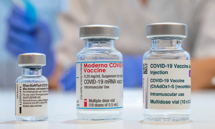 Used vials of the Pfizer-BioNTech, Moderna and AstraZeneca coronavirus disease (COVID-19) vaccines are pictured at the Skane University Hospital vaccination centre in Malmo, Sweden, on Feb. 17, 2021. (Sweden Out via Reuters) 