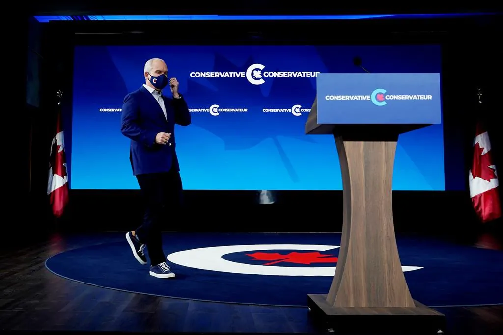 Conservative Leader Erin O'Toole walks on stage as he prepares to speak in Ottawa on September 21, 2021. (The Canadian Press/Adrian Wyld)