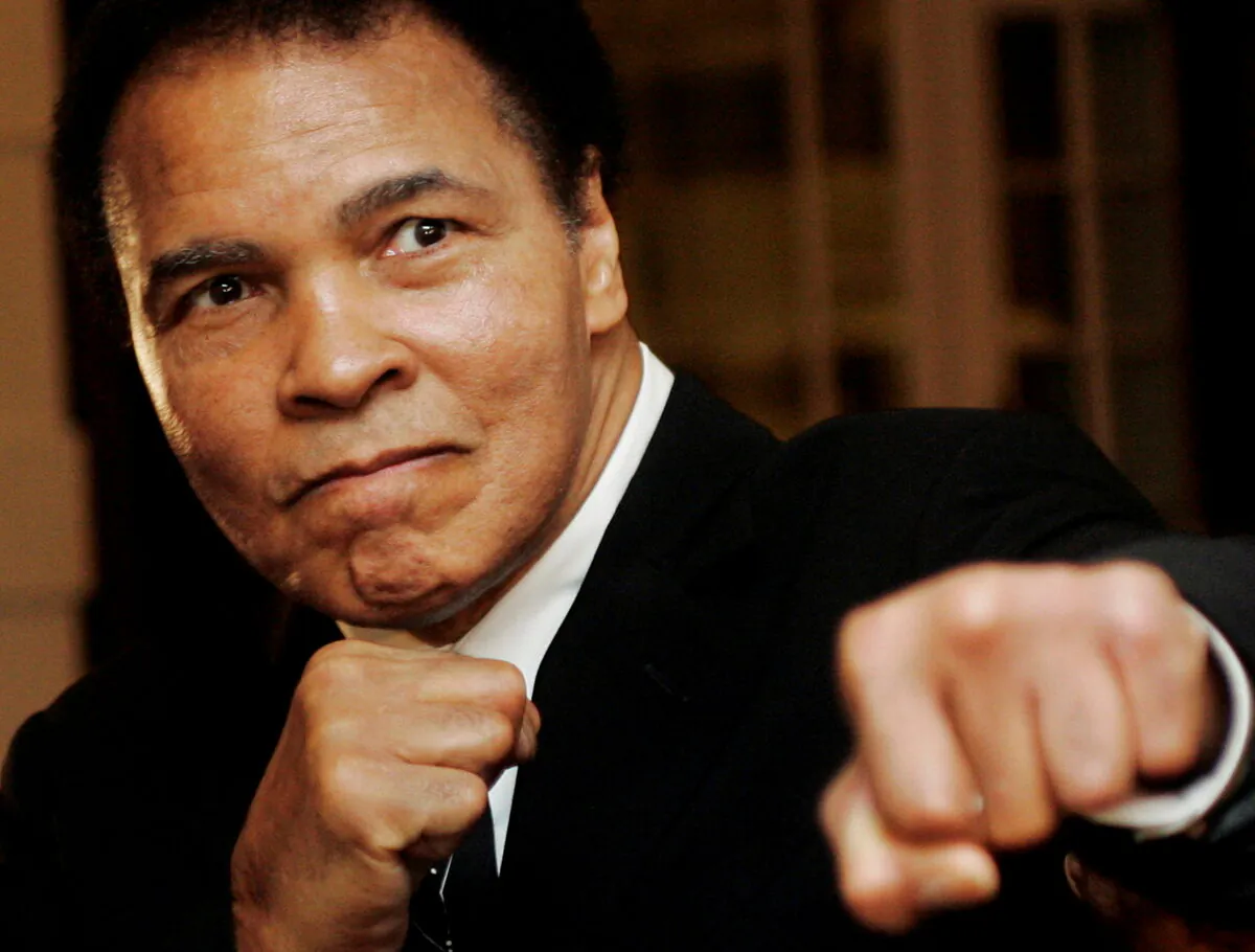 U.S. boxing great Muhammad Ali poses during the Crystal Award ceremony at the World Economic Forum (WEF) in Davos, Switzerland on Jan. 28, 2006. (Andreas Meier/Reuters)