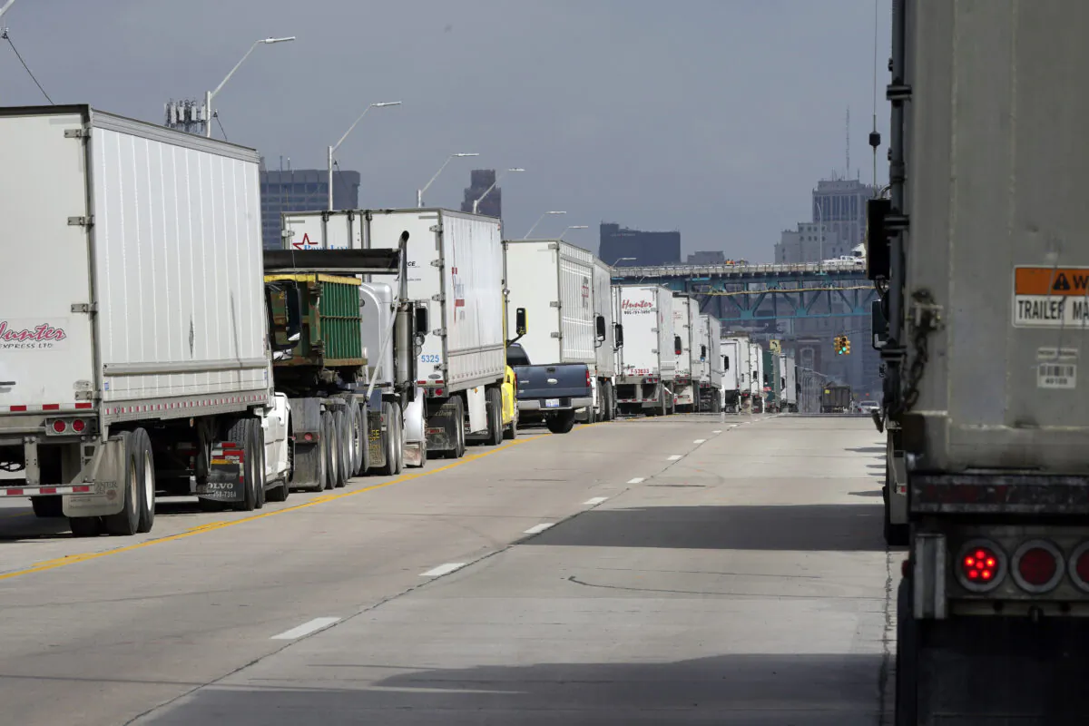 Traffic backs up on Fort St next to the Ambassador Bridge in Detroit, on Oct. 4, 2021. (Carlos Osorio/AP Photo)