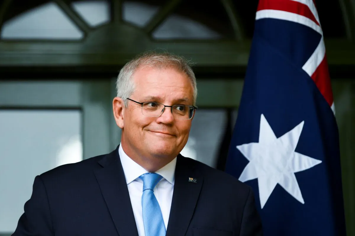 Australian Prime Minister Scott Morrison discusses travel restrictions during a press conference in Canberra, Australia, on Oct. 1, 2021. (Lukas Coch/AAP Image via AP)