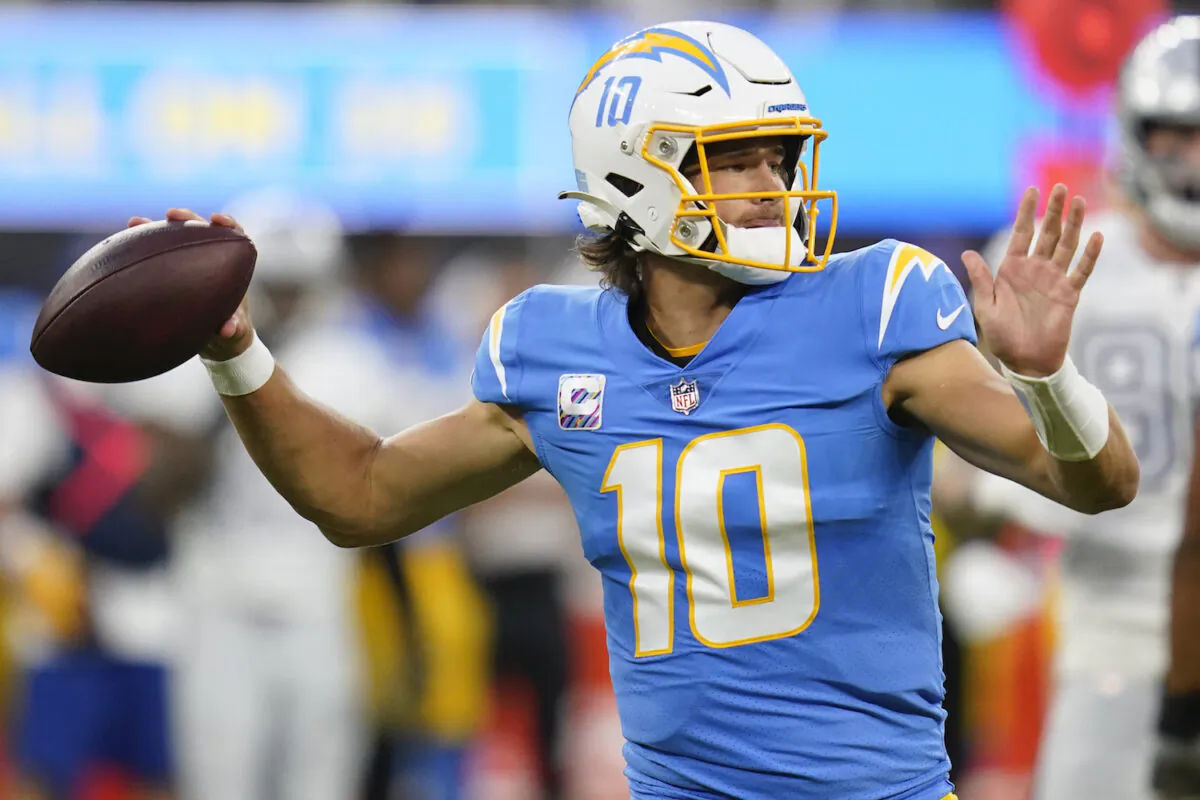Los Angeles Chargers quarterback Justin Herbert throws a pass during the first half of an NFL football game against the Las Vegas Raiders in Inglewood, Calif., on Oct. 4, 2021. (Ashley Landis/AP Photo)